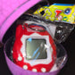 Tamagotchi Toy Tumblers In Dinosaur Egg (Game)