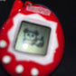 Tamagotchi Toy Tumblers In Dinosaur Egg (Game)
